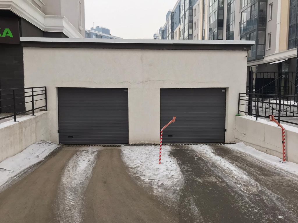 Установка гаражных ворот автоматических Alutech